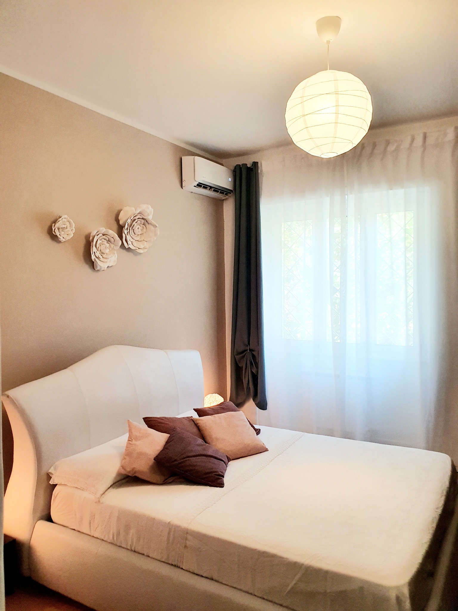 Single sofa bed by the window
