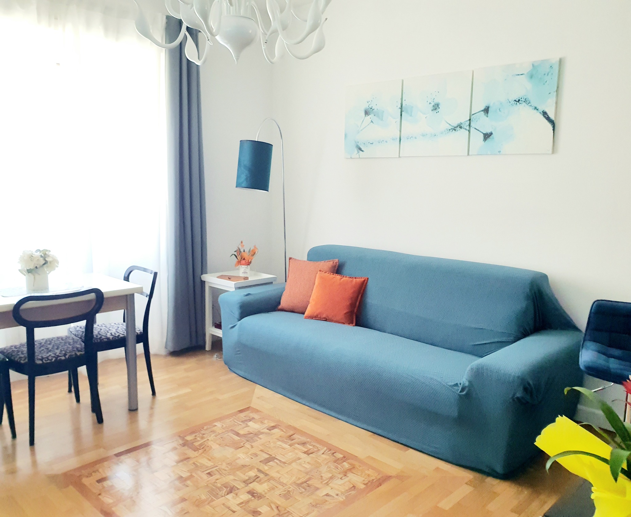 Living room with sofa and dining table