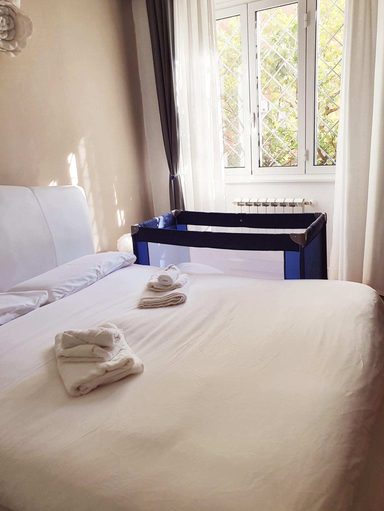 Bedroom prepared with fresh towels